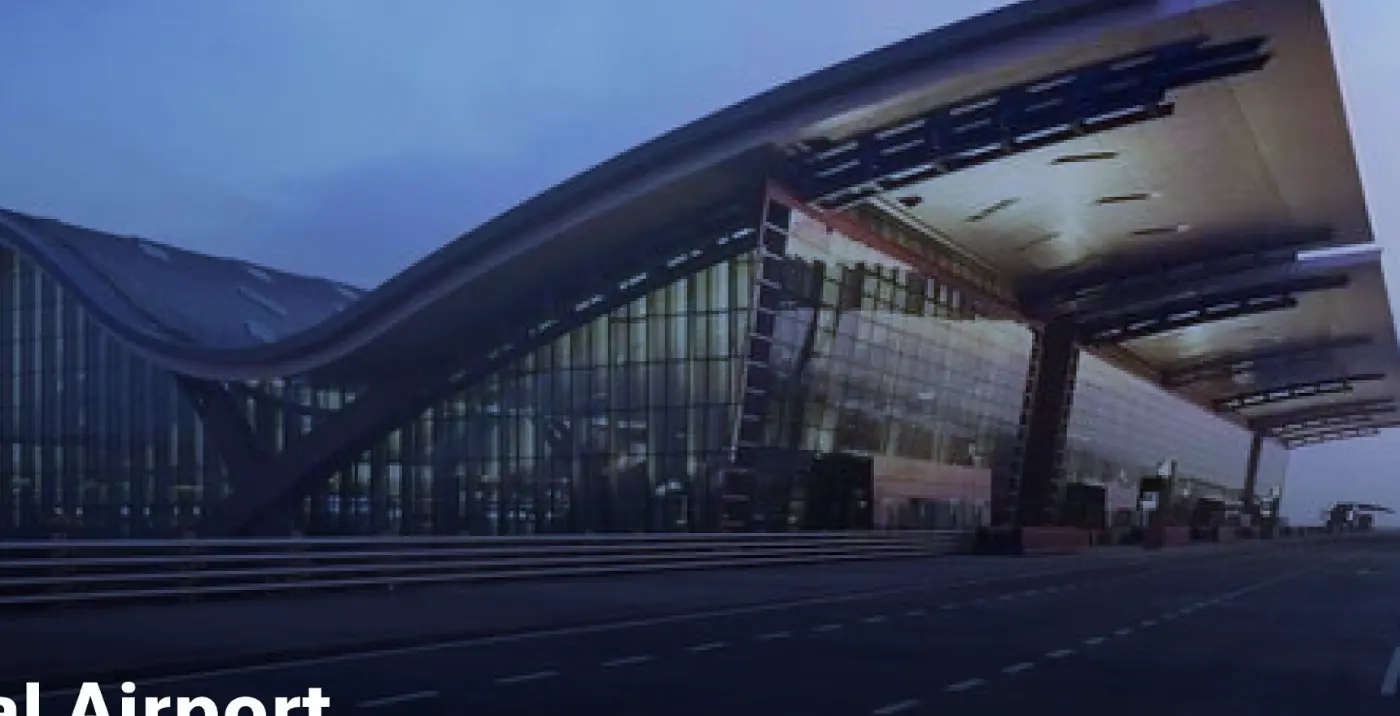 Hamad International Airport terminal at dusk